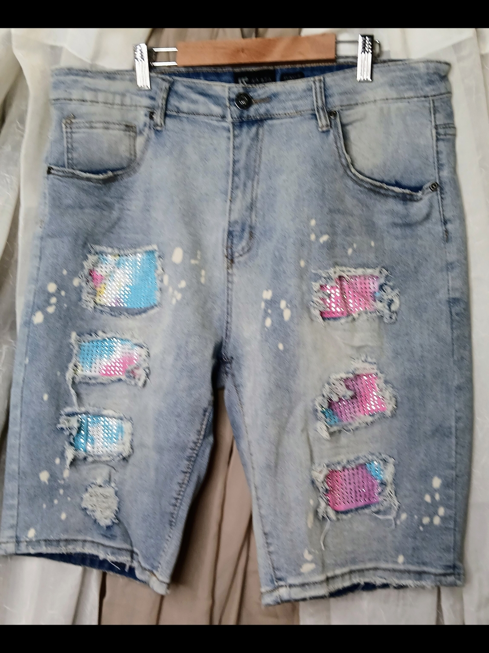 Light Blue Distressed Men’s Jean Shorts with Iridescent Patch Details